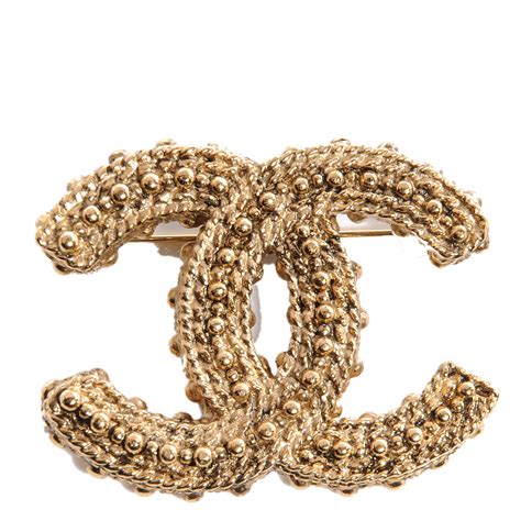 chanel gold brooch